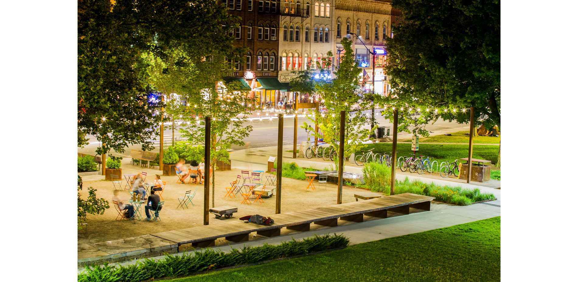 At the edge of the lawn and plaza an 80’ long urban lounge of black locust and steel offers flexible gathering, sleeping, play and a ping pong surface…